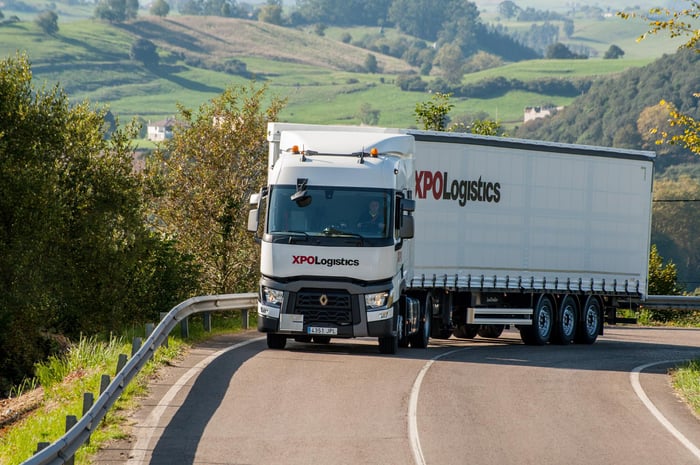 An XPO truck on the highway.