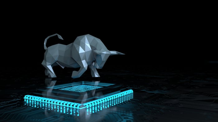 Rendering of a geometric bull standing on top of a computer chip.