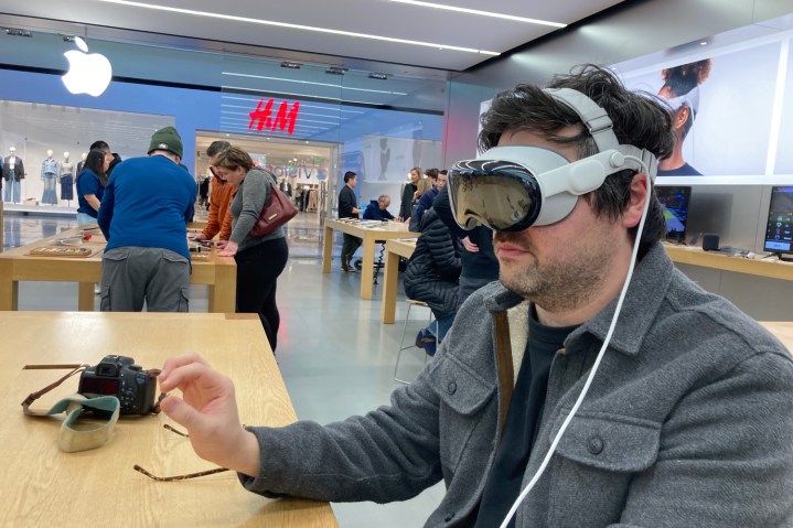 Someone using Vision Pro at a demo in an Apple Store.