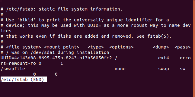 The /etc/fstab file in less in a terminal window