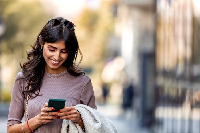 Person looking at phone.