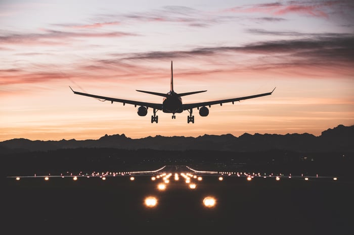 An airplane landing. 