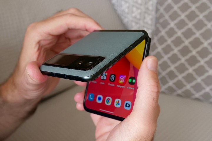 A person opening the Motorola Razr 40.