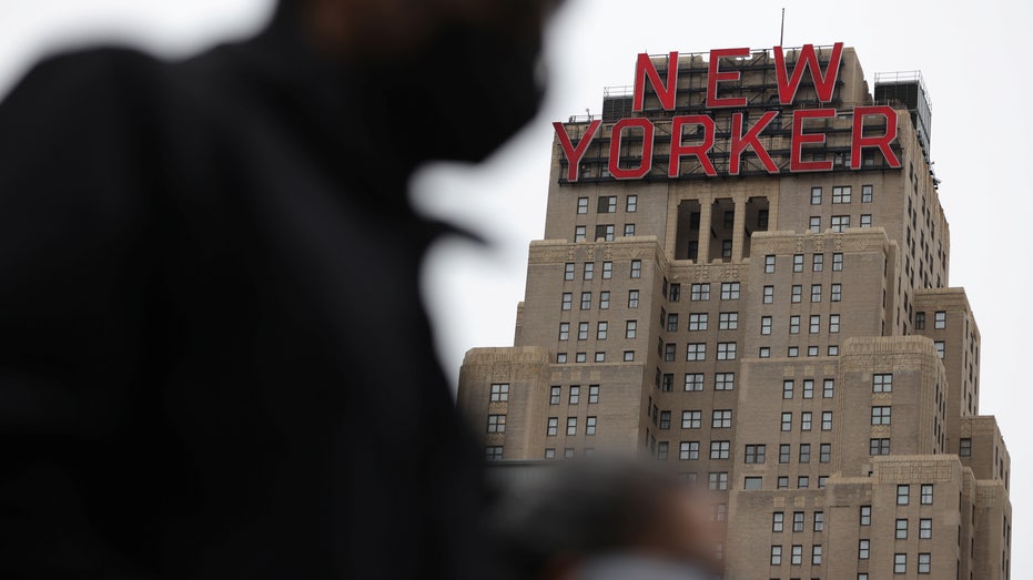 https://www.foxbusiness.com/real-estate/A person walks by The New Yorker, A Wyndham Hotel, in Manhattan, New York City