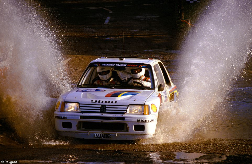 In order to enter FIA competitions, car makers had to sell a minimum of 200 road-legal versions of the racing machines, hence why the 205 Turbo T16 was born. Pictured: Ari Vatanen splashes his Peugeot 205 T16 to victory at the Lombard RAC Rally in November 1984