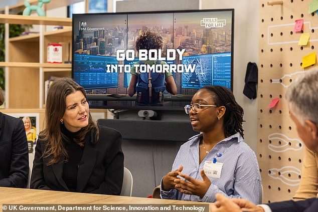 Technology Secretary Michelle Donelan speaks to Arin Ososanya, as the government launches its enrolment drive for digital skills bootcamps