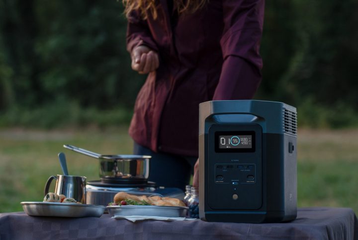 EcoFlow DELTA 2 on table at campsite for quick charging.