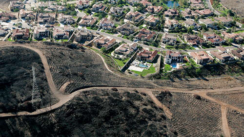 An aerial view of the burnline at the edge of The Crosby.