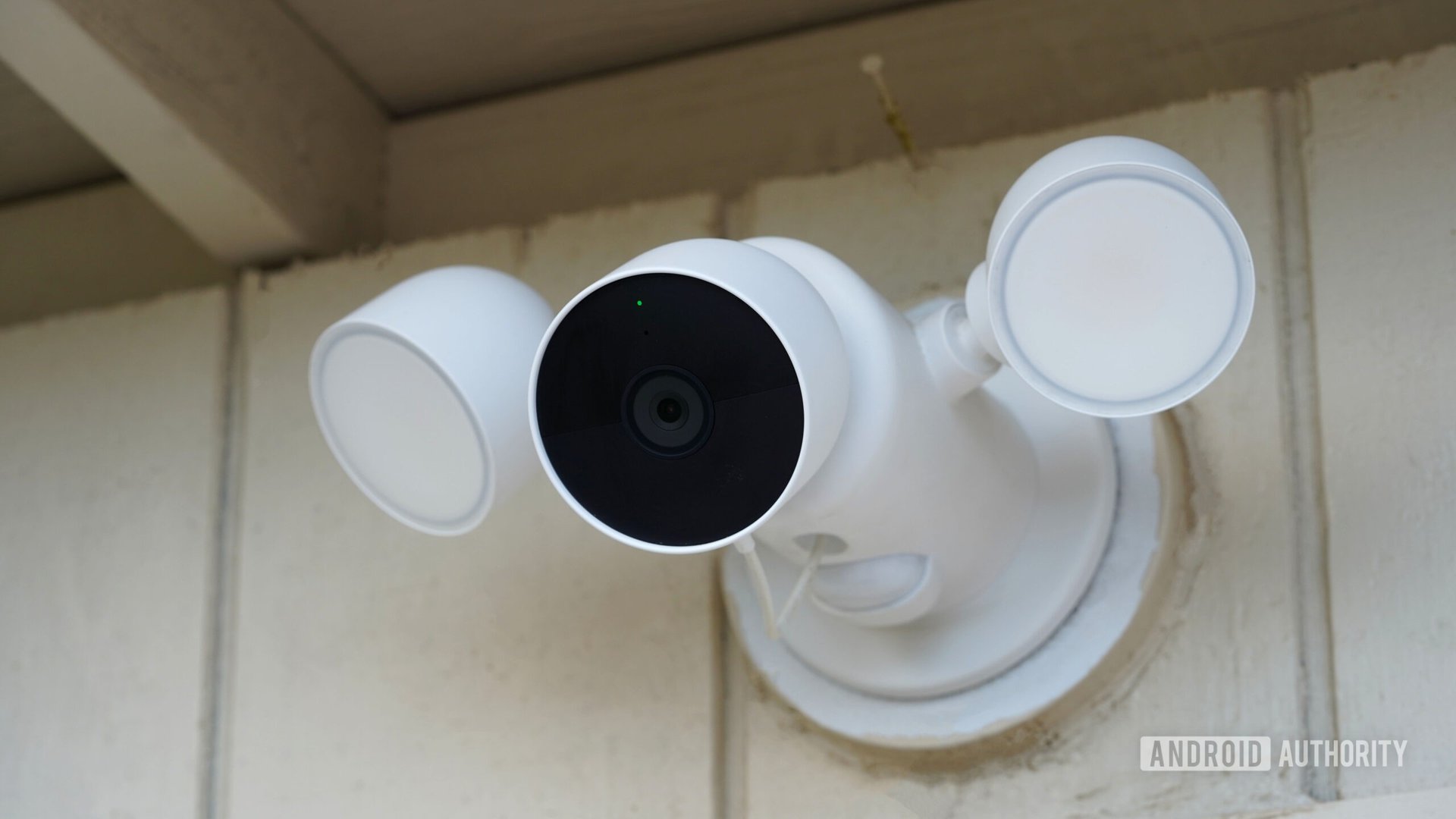 A Google Nest Cam with Floodlight is attached to a shed.