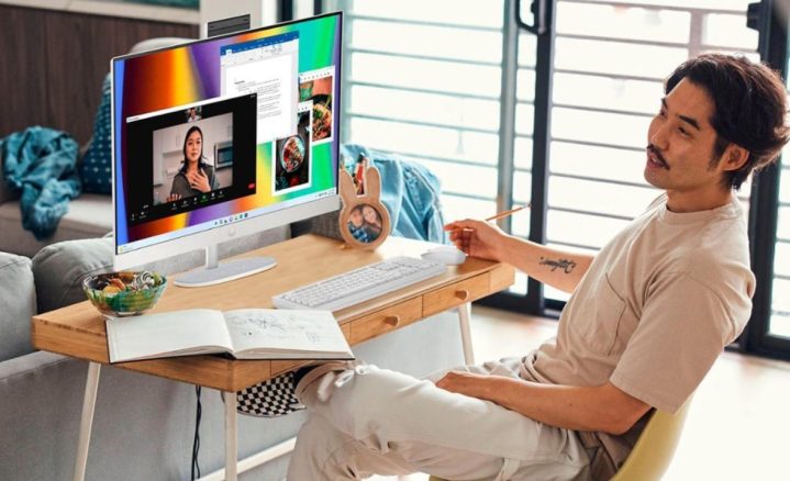 A man does creative work at the HP 27-inch all-in-one PC.