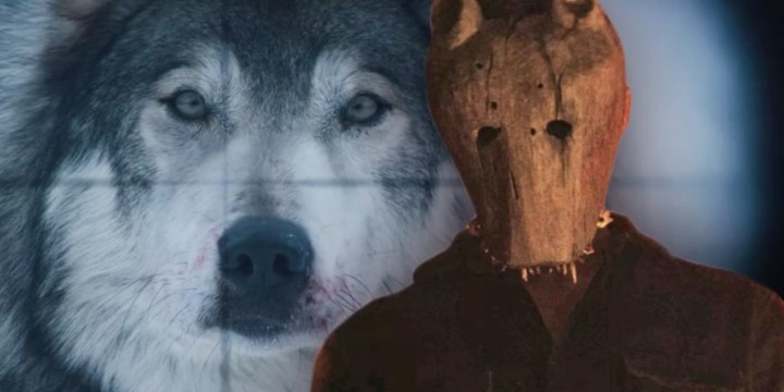 A man in a wolf mask stands in Hold the Dark.