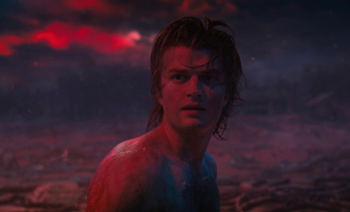 A shirtless Joe Keery stares in disbelief in Stranger Things.