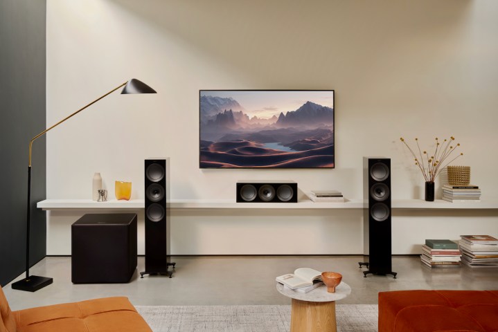 The KEF Kube 15 MIE subwoofer in a living room setting.