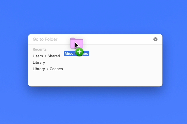 Dragging a folder into the Go To Folder window.