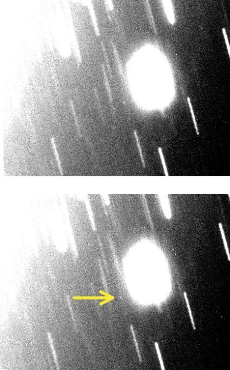 The discovery image of the new Uranian moon S/2023 U1 using the Magellan telescope on November 4, 2023. Uranus is just off the field of view in the upper left, as seen by the increased scattered light. S/2023 U1 is the faint point of light in the center of the image. (There is an arrow pointing to it in the lower version of the image). The trails are from background stars. 