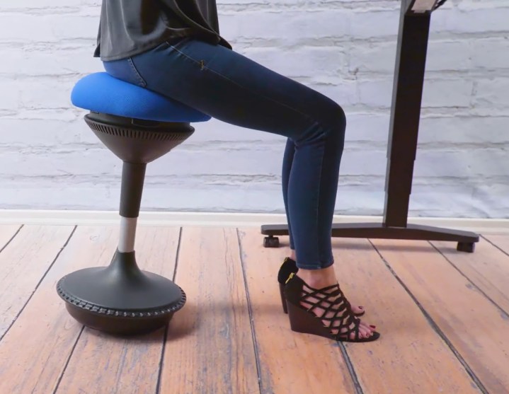 A person using the Motion Stool.