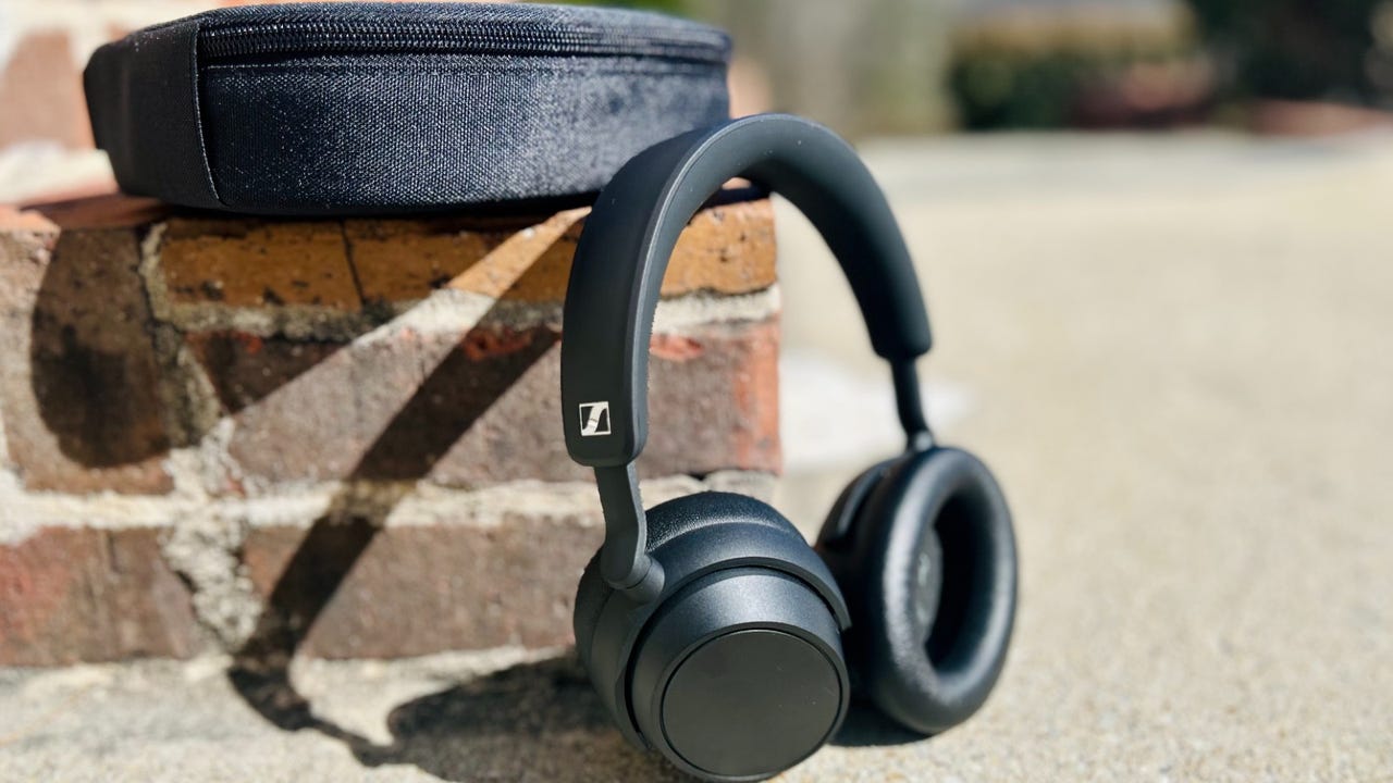 Sennheiser Accentum Plus headphones lying on a brick mantle