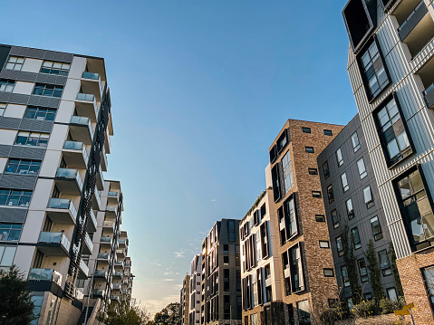 Apartment buildings blue sky, low angle view