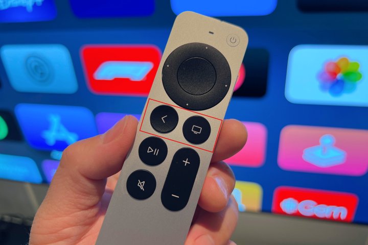 An Apple Siri remote in a hand with the Home and Back buttons highlighted.