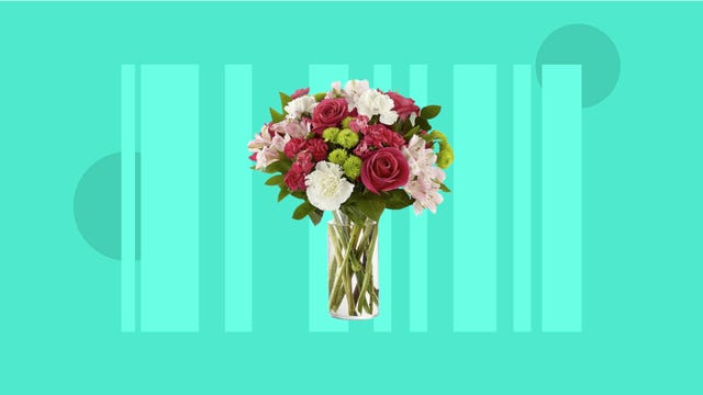 A colorful bouquet from FTD is displayed against a teal background.