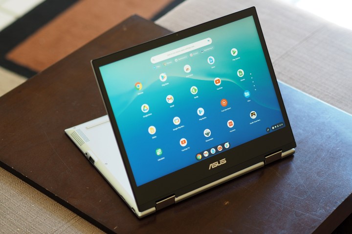 Asus Chromebook Flip CM3 folded backward, sitting on tabletop.