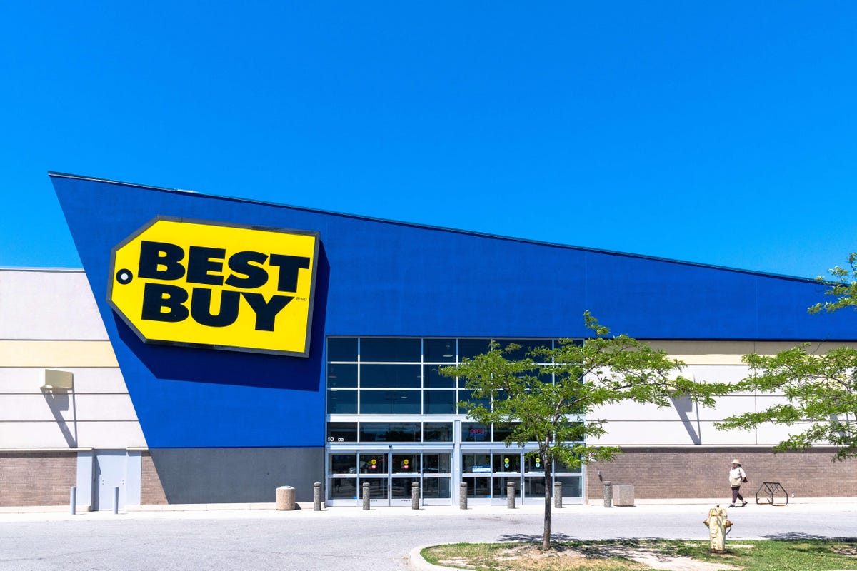 Entrance of a Best Buy store during a day with blue clear sky.