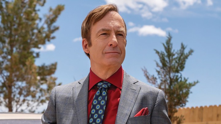 Saul Goodman looking up while wearing a suit in Better Call Saul.