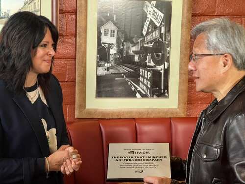 Denny's CEO Kelli Valade and Nvidia CEO Jensen Huang celebrate where Nvidia began.