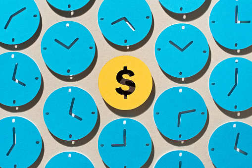 Dollar Sign Surrounded by Clocks, Time Is Money Concept