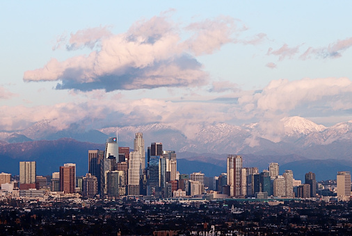 Downtown Los Angeles with Snowcapped Mountains on the Back