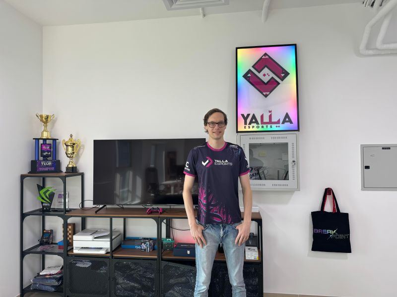 Klaus Kajetski stands in the headquarters of Yalla Esports.