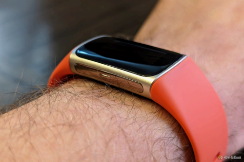 Fitbit Charge 6 on a wrist.