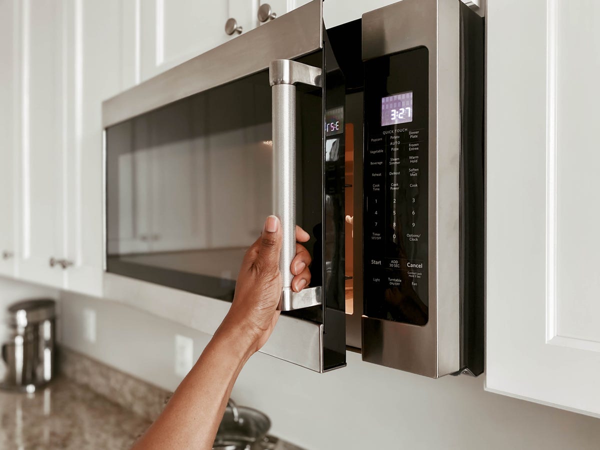 Hand opening microwave door