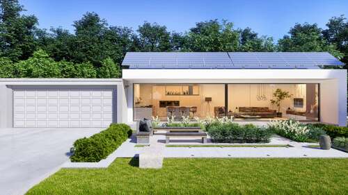 A small house with rooftop solar panels and large windows.