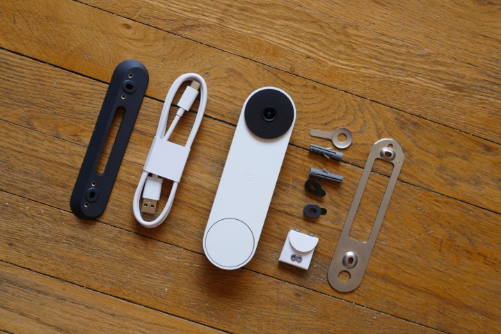 Google Nest Doorbell (battery) components laid out on floor.