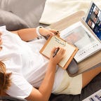 woman using huanuo lap desk