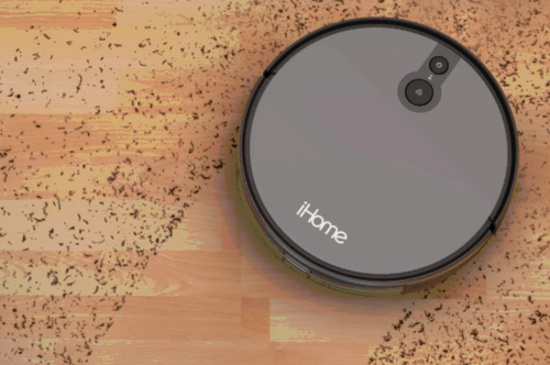 The iHome AutoVac Juno robot vacuum cleaning the floor.