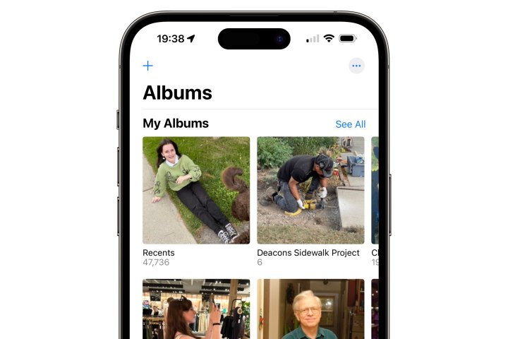 iPhone showing Photos app Albums view.