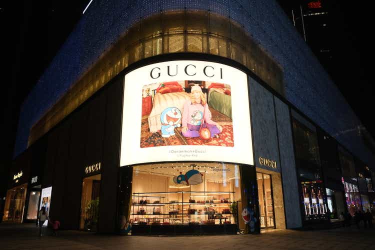 Facade of GUCCI flagship store at night.