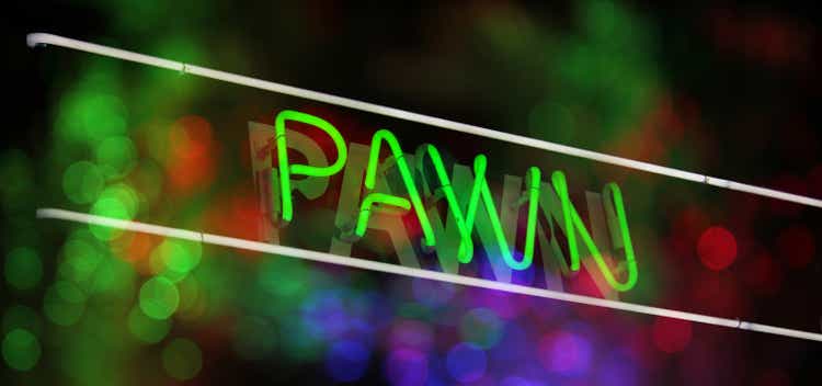 Vintage Neon Sign in Window of Pawn Shop