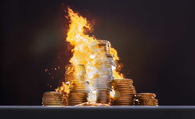 Money on fire - amount of burning money concept