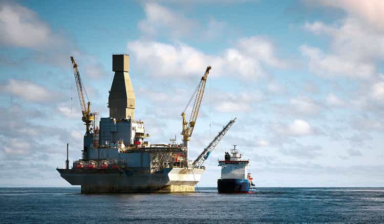 Oil rig offshore drilling platform and support vessel