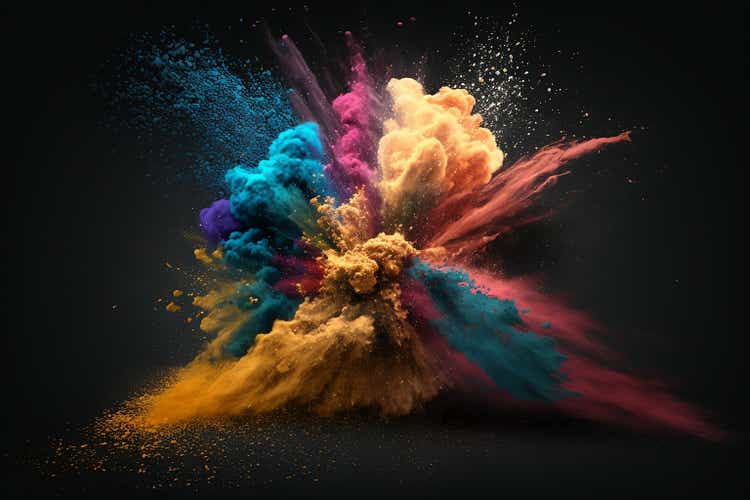 Exploding colours of dust and powder on a dark background