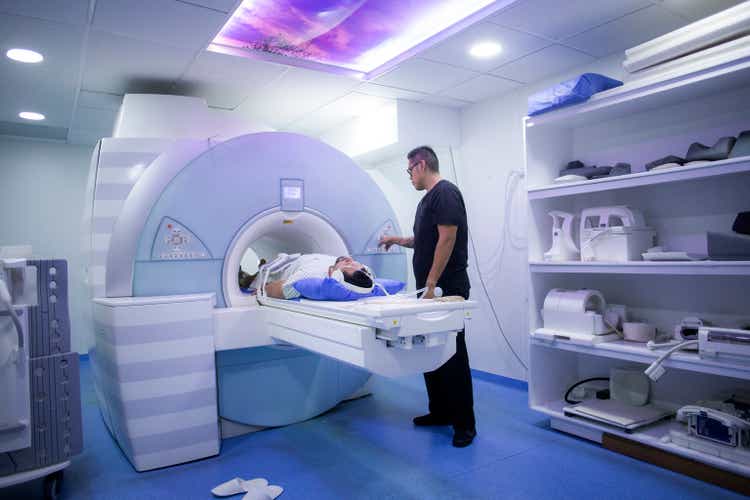 Man undergoing a MRI scan in a hospital