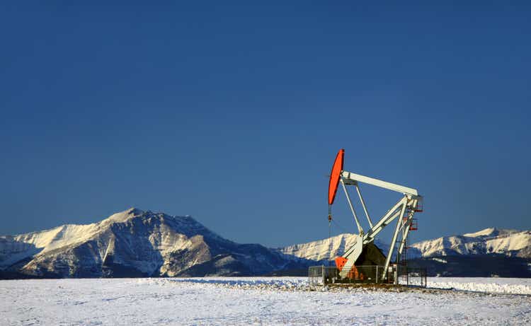 Red Pumpjack in Winter Alberta