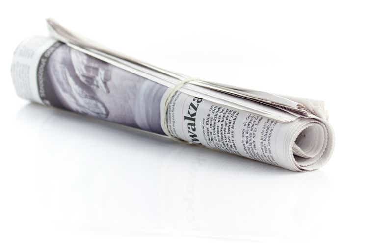 Rolled up newspaper