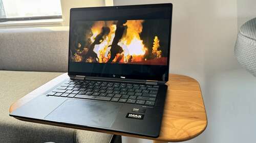 HP Spectre x360 14 on a wooden table