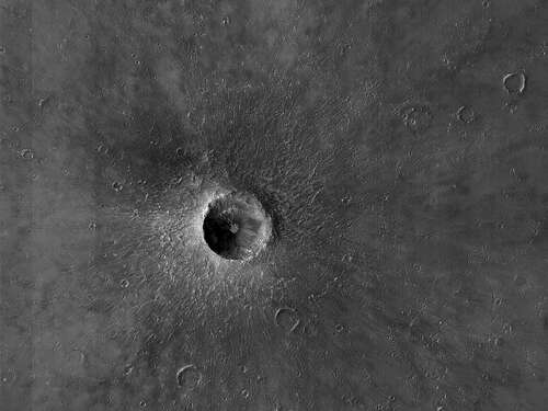 The "very recent" impact crater spotted in the equatorial region of Mars.