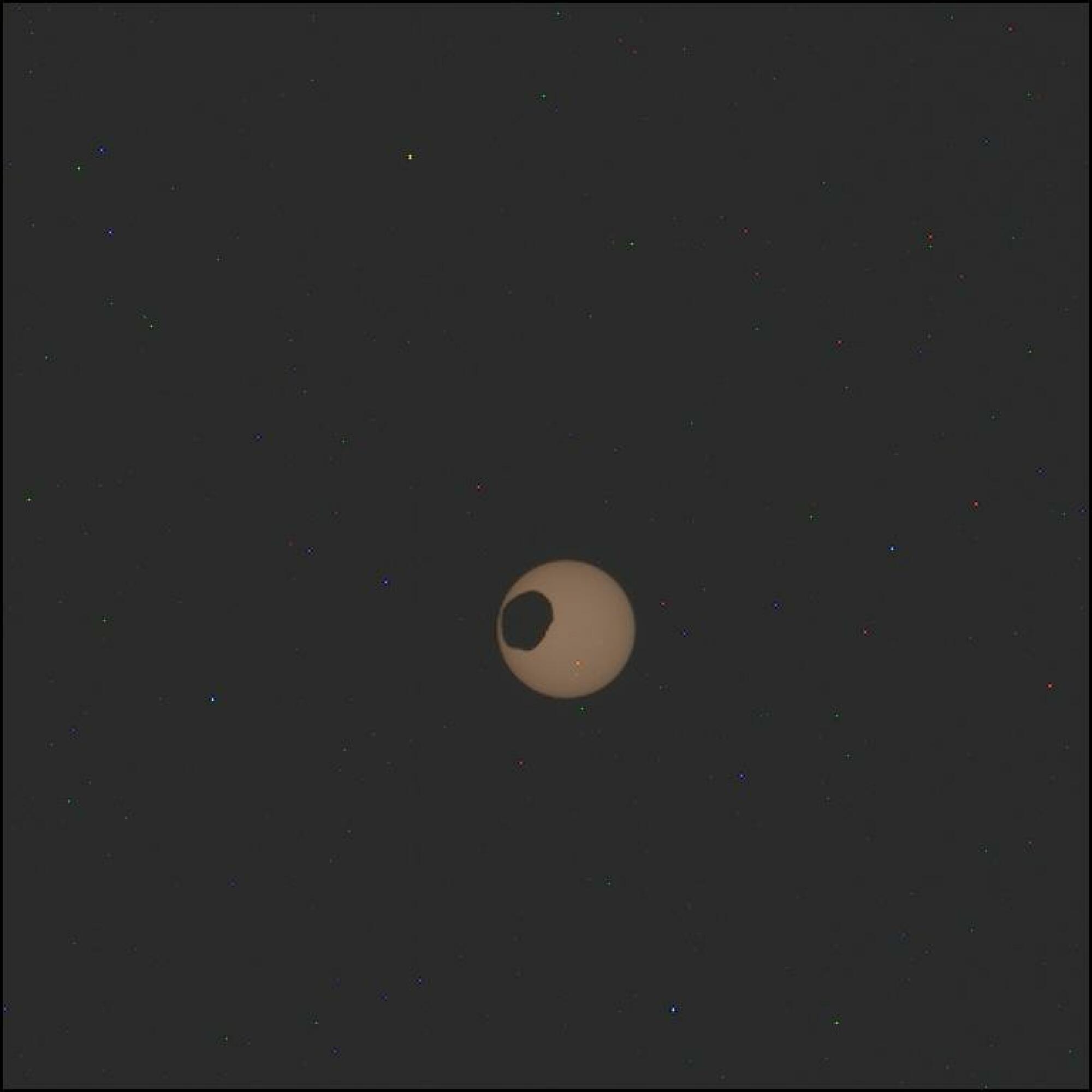 On Feb. 8, 2024, NASA's Mars Perseverance rover captured this image of the moon Phobos eclipsing the sun.