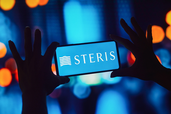 In this photo illustration, the Steris Corporation logo is...